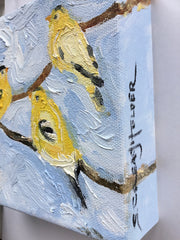 Three Goldfinches